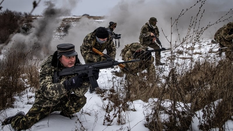 Civilians participate in a Territorial Defence unit training session in Obukhiv, Ukraine.