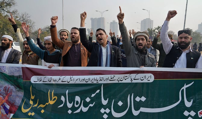 Members of Muslim Talba Mahaz Pakistan chant slogans at a demonstration to condemn Iran strike in the Pakistani border area.