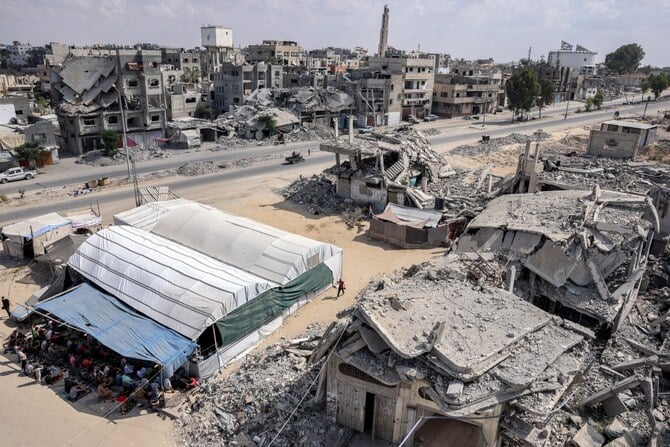 Destroyed buildings in Khan Yunis in the southern Gaza Strip on October 18, 2024 amid the ongoing war in the Palestinian territory between Israel and Hamas.