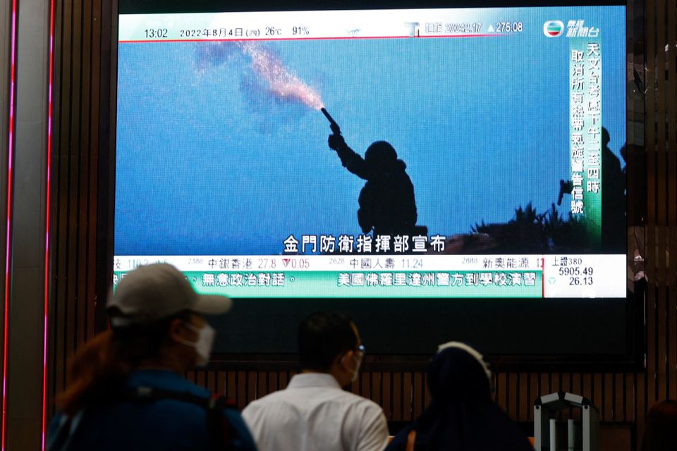 A TV screen shows China's People's Liberation Army has begun military exercises in Hong Kong, China on August 4, 2022.
