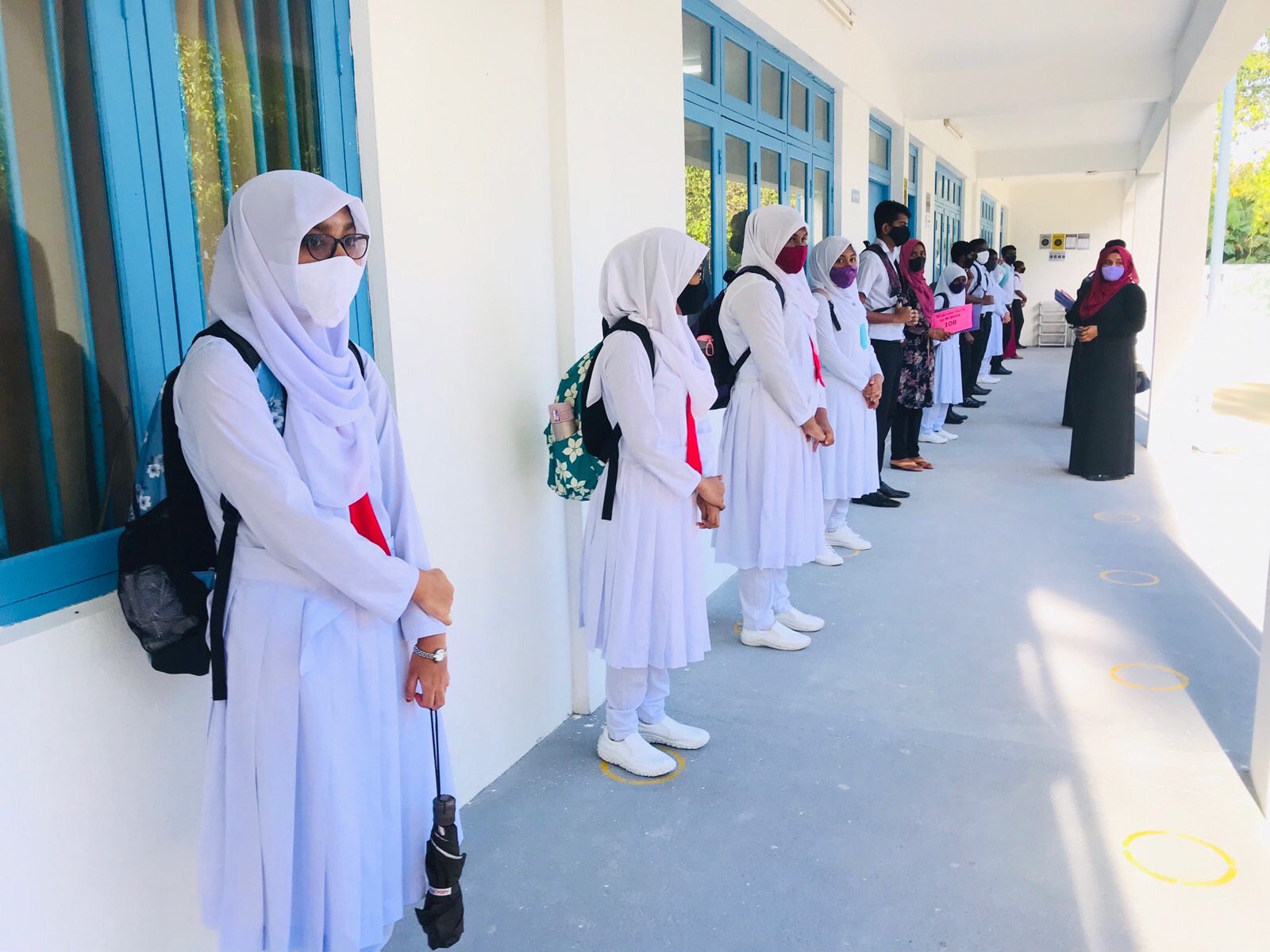 Students arriving to a school in Male' City