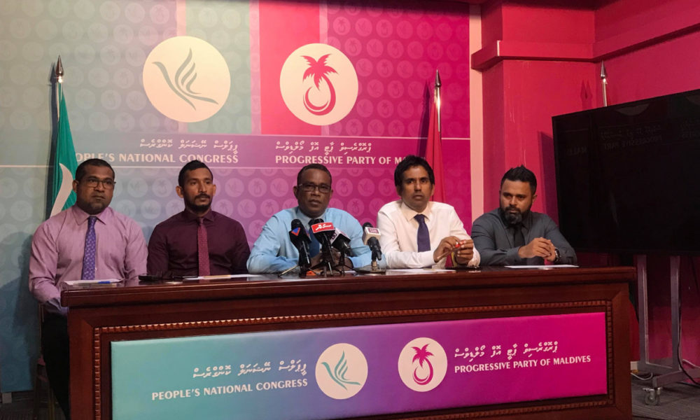 Opposition party coalition leaders, during a press conference.