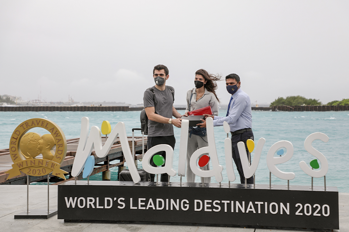 The 100,000th tourist to arrive in the Maldives in March 2021.