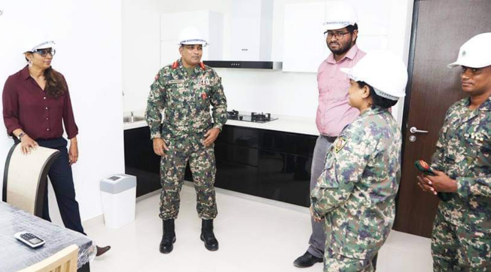 Defence Minister inspecting SIFCO Hiyaa flats.