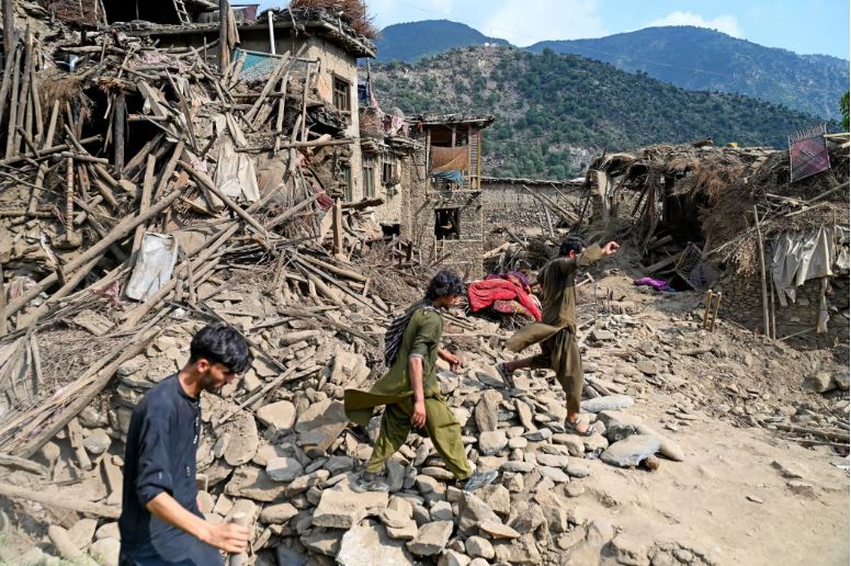 Damaged houses in a village in Kunar province, Afghanistan, on Monday. Photo: wakil kohsar/Agence France-Presse/Getty Images