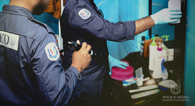 Maldives Police service checking a home in Male’ City. Photo: Police Media.