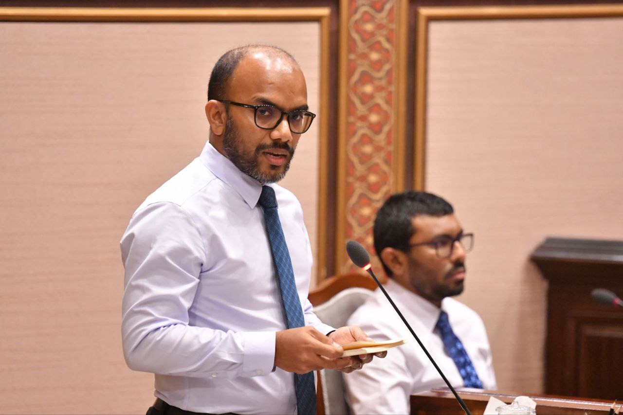 Finance Minister Ibrahim Ameer presenting the government budget to the parliament for the next year.