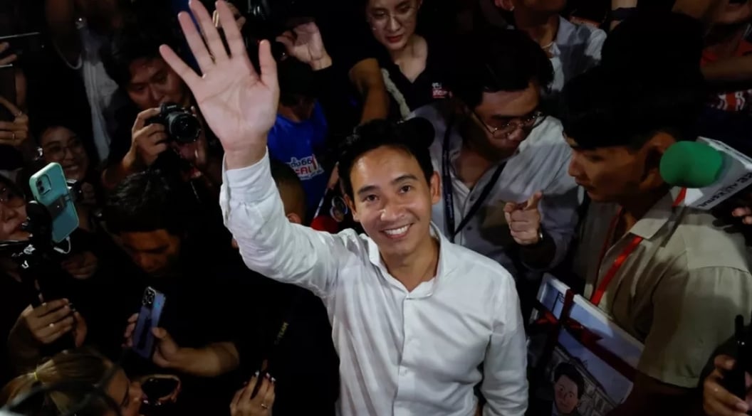 Move Forward Party leader Pita Limjaroenrat waves to supporters after a stunning election performance. Photo: Reuters