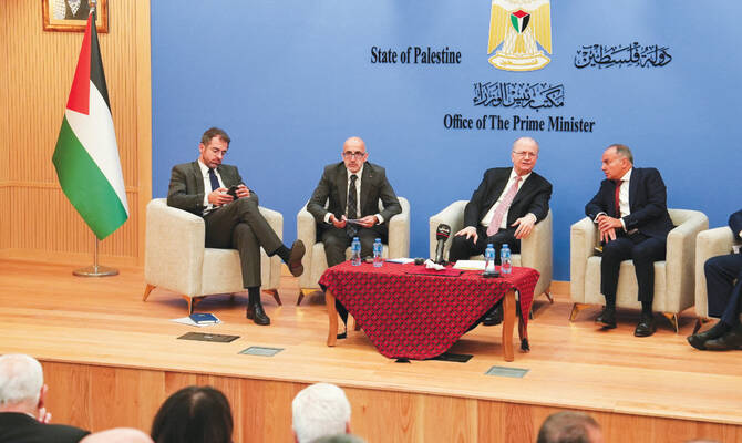 Palestinian Prime Minister Mohammed Mustafa attends a meeting on the Gaza recovery and reconstruction plan in Ramallah in the Israeli-occupied West Bank. (Reuters)