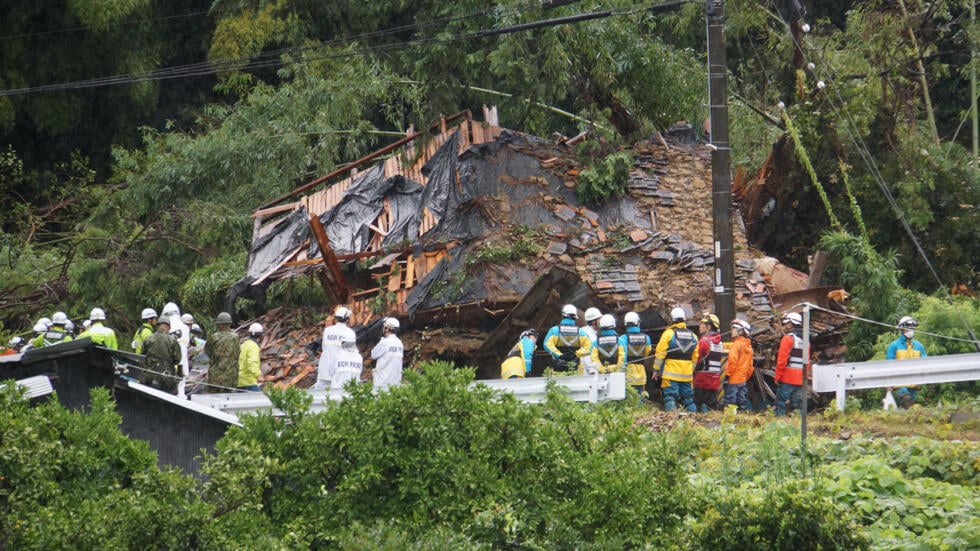 Two people were rescued from this landslide-hit house in Gamagori, Aichi prefecture in Japan, but three others are missing © STR / JIJI Press/AFP