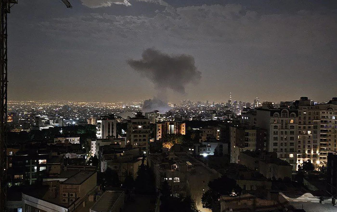 Smoke billowing from a site targeted by an Israeli strike in Tehran (AFP/SEPAH NEWS)