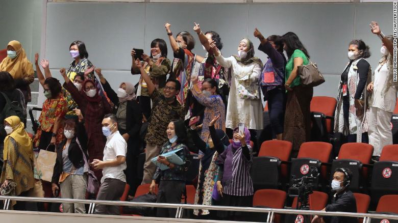 Indonesian activists celebrate parliament's passing of the sexual violence bill in Jakarta, Indonesia.