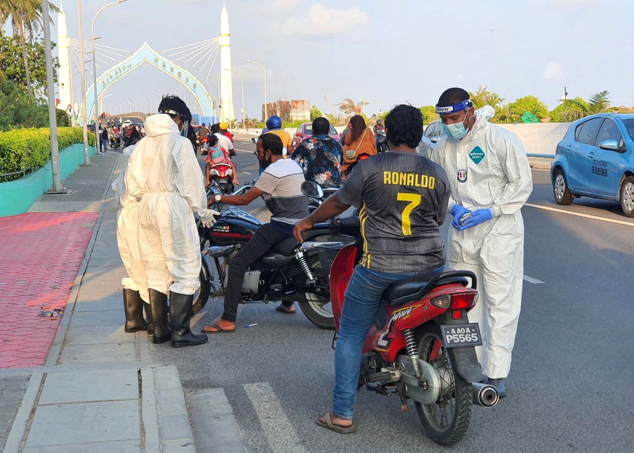 Random sample taken for Covid testing in Male' City. Photo: Shah, Ras Online.