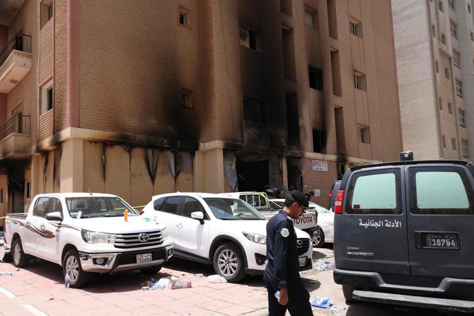 Wednesday’s dawn blaze quickly engulfed a housing block home to some of the many foreign laborers in Kuwait. (Photo: AFP)