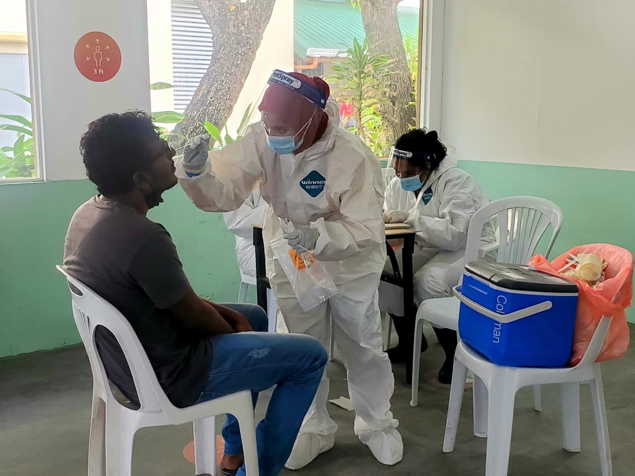 Sample taking for Covid-19 testing in Male' City. Photo: Shah, Ras Online.