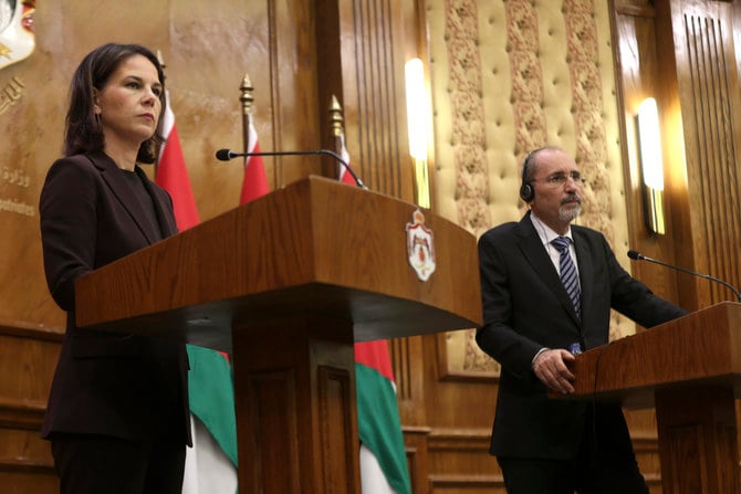 German Foreign Minister Annalena Baerbock announces that her country was sending humanitarian aid to Gaza civilians during a joint press conference with Jordan's FM Ayman Safadi in Amman.