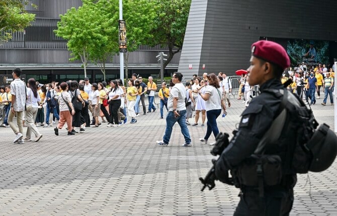 File photo of an armed police officer in Singapore (AFP)