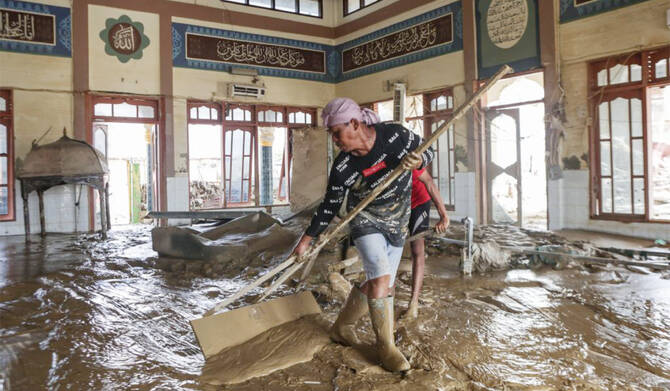 Flood debris blocks Mosque as Sumatra Muslims struggle weeks after disaster