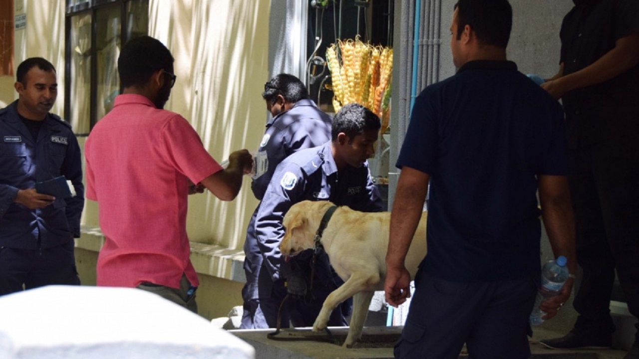 Maldives Police Service conducting an operation using sniff dogs