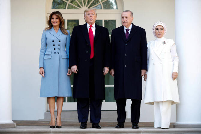 US President Donald Trump and first lady Melania Trump stand with Turkiye’s Pressident Tayyip Erdogan and Emine Erdogan at the White House in Washington in 2019. (Reuters)