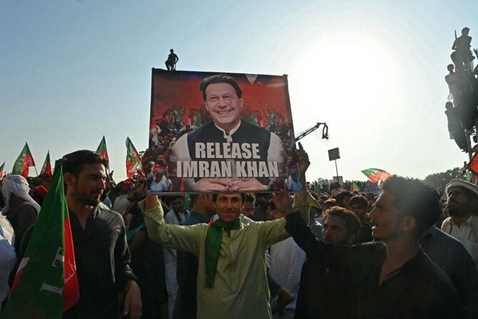 Activists of Pakistan Tehreek-e-Insaf (PTI) party of former country’s prime minister Imran Khan, take part in a public rally on the outskirts of Islamabad on September 8, 2024. (AFP)