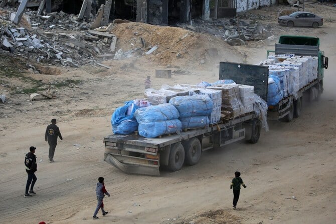 A truck loaded with humanitarian aid drives through Rafah in the southern Gaza Strip on February 18, 2025 (AFP)