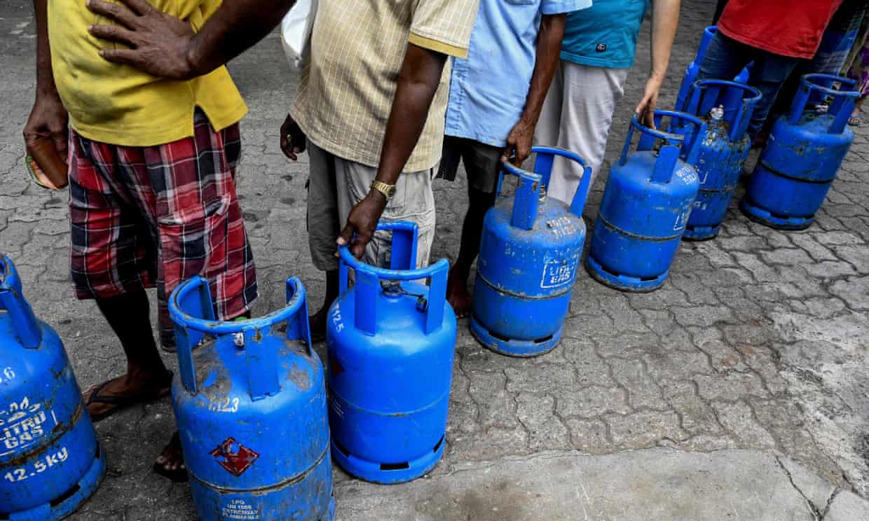 People queue to buy Liquefied Petroleum Gas cylinders in Colombo as shortages of essentials gripped the island. (Photo: Ishara S Kodikara/AFP)