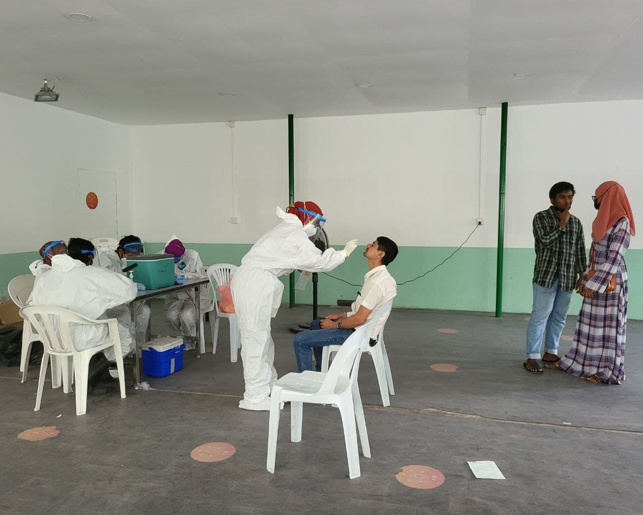 Sample taking for Covid-19 testing in Male' City. Photo: Shah, Ras Online.